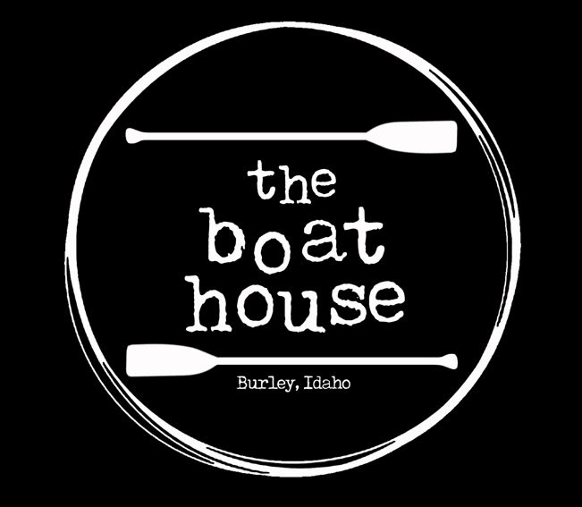 A black and white logo for the boat house.