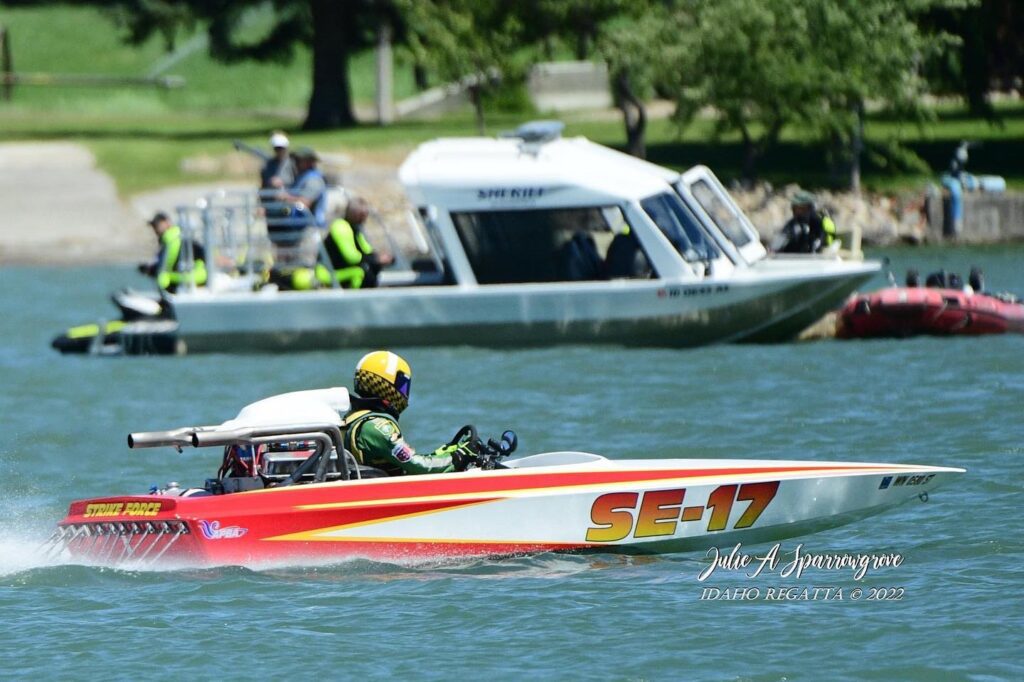 A man in a boat on the water.